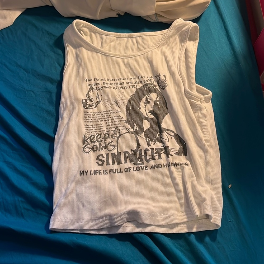 Woman’s white tank